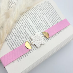 Elastisches Schneeflocken-Lesezeichen - Weiße Flocke, rosa Band mit goldenen Akzenten